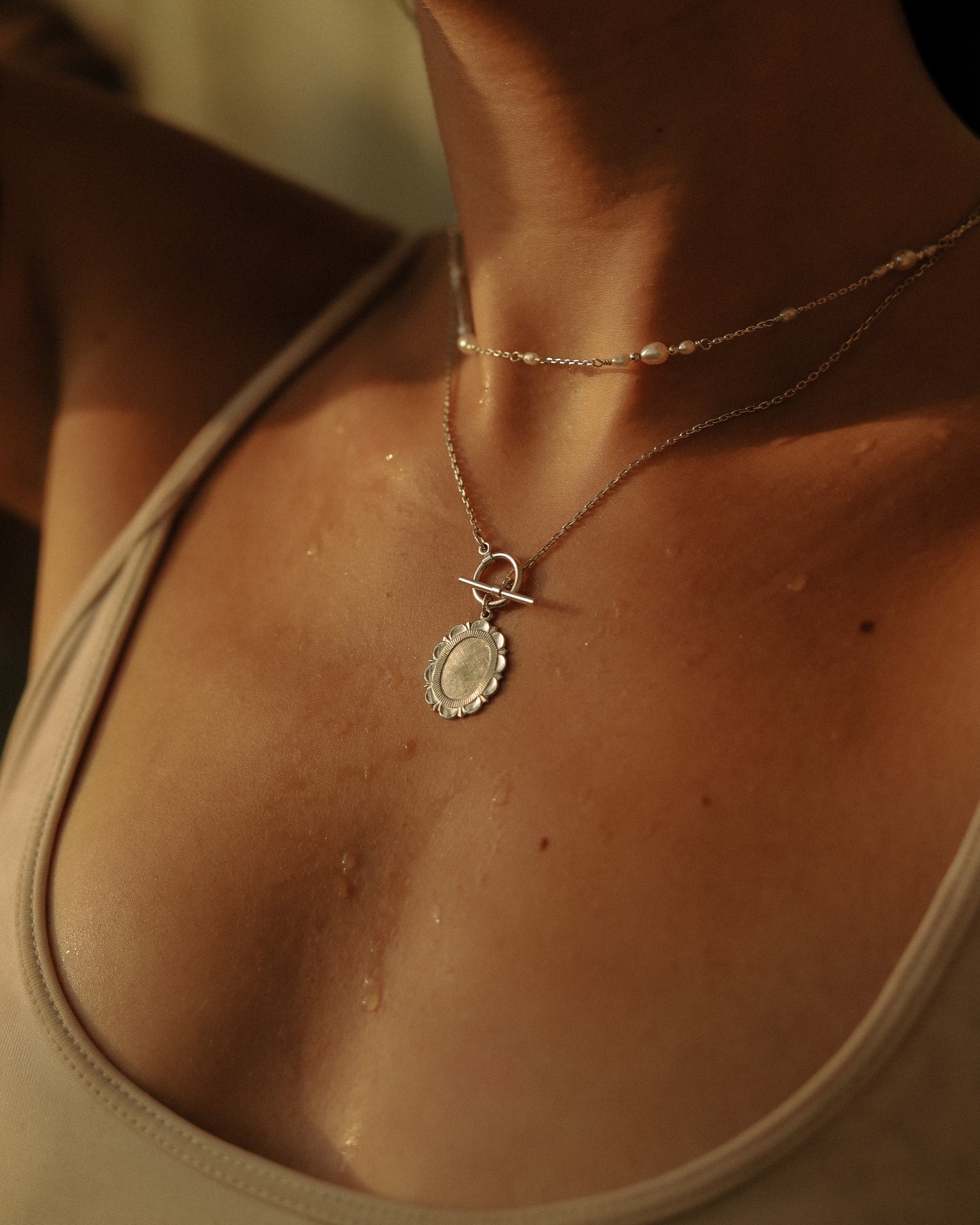 Medallion with toggle clasp