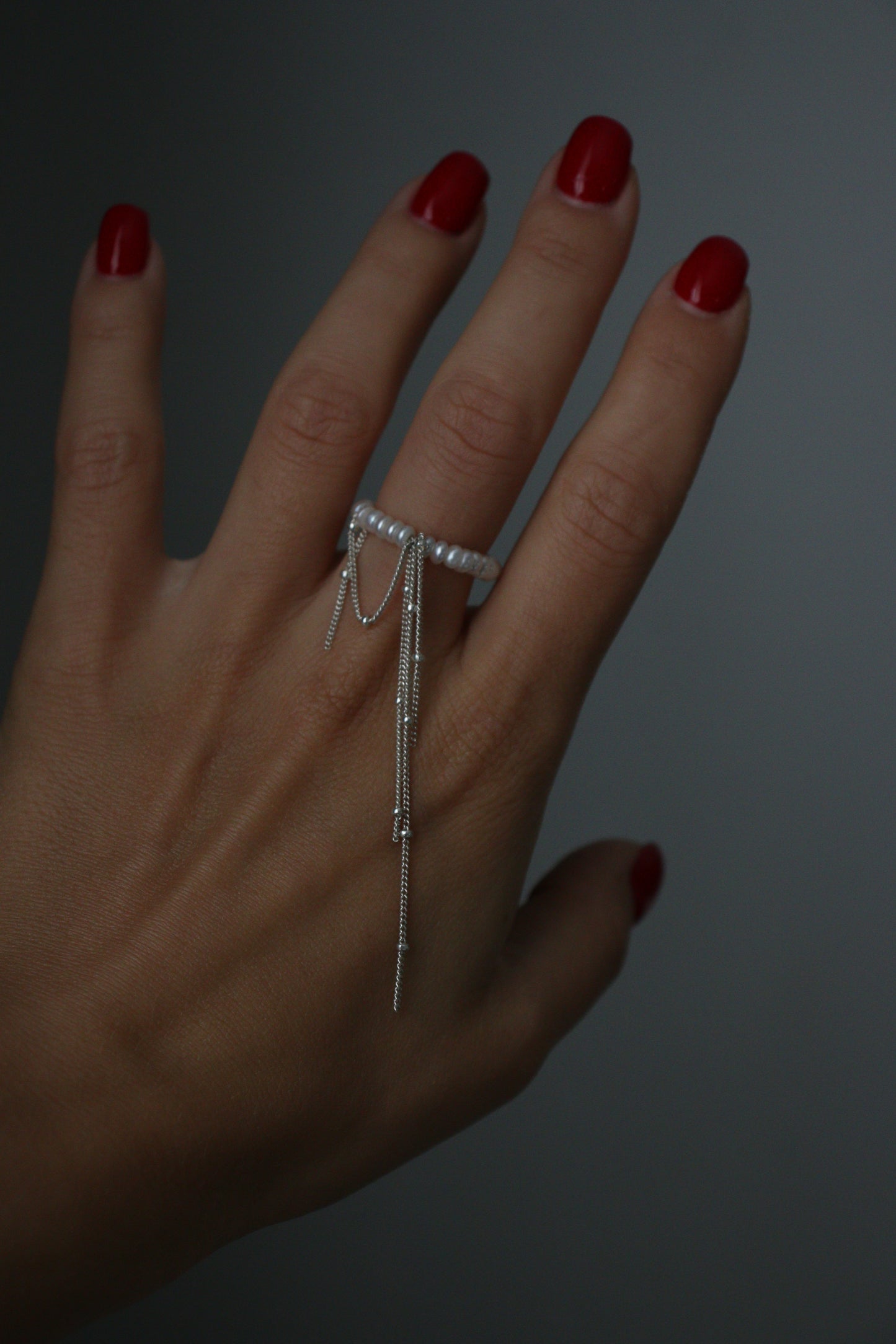 Ring with chains