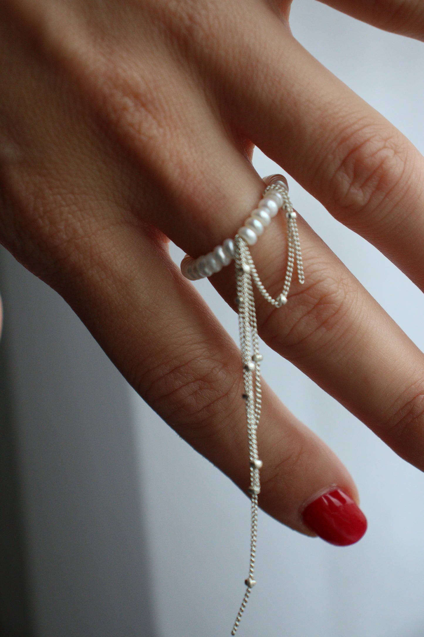Ring with chains