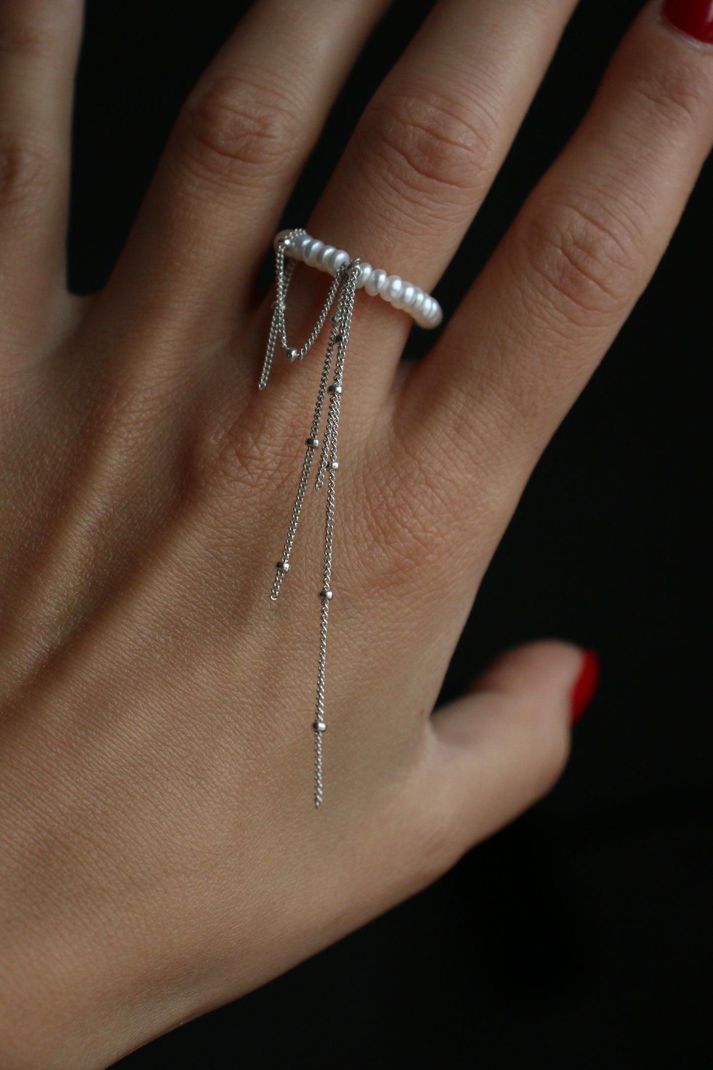 Ring with chains