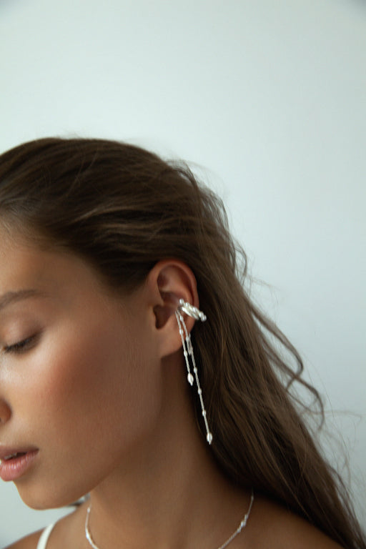 Cuff with chains and pearls