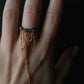 Black pearl ring with chains 