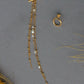 Asymetrical earrings transformers gold