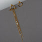 Asymetrical earrings transformers gold